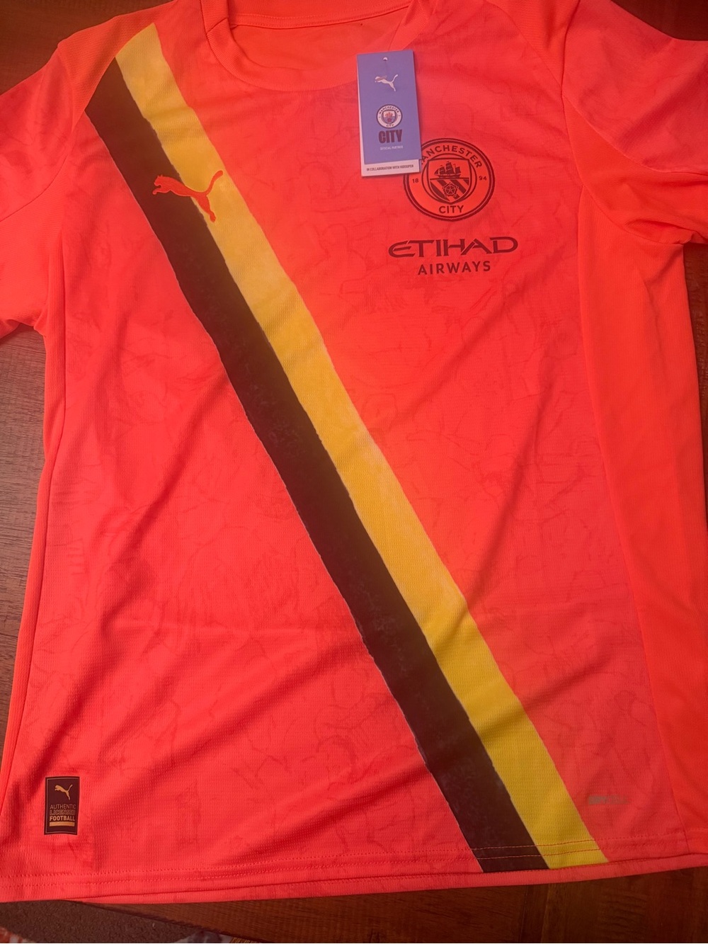 PUMA Adult Manchester City 2025 Orange KidSuper Jersey